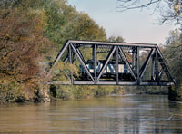 train crossing bridge in fall